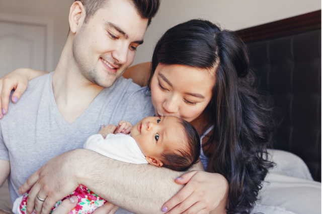 Man and woman couple with baby