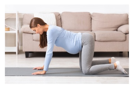 5 Yoga Moves You Can Do Right Now to Relieve Pregnancy Pain and Discomfort